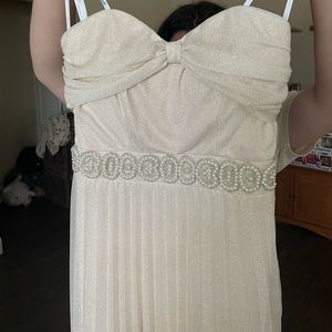 Long ivory, prom dress with bow backing